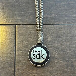 The Sak Black and Silver bag hanger